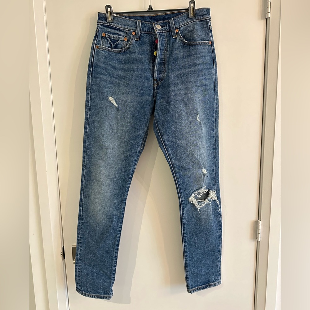 Levi’s 501 with multi coloured buttons